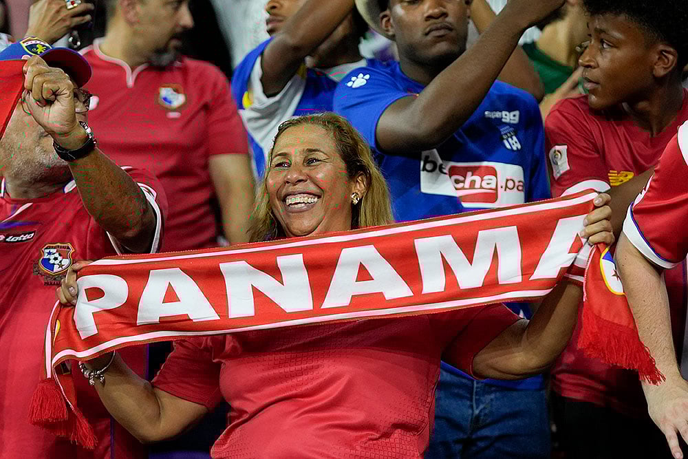 File Photo : Panama fans roar in support as their team battles on the field.